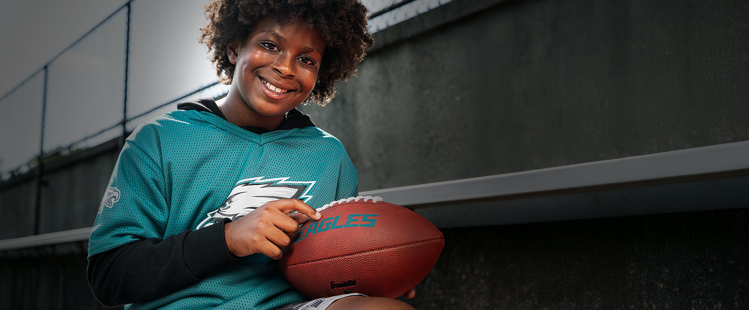 kid in nfl football costume