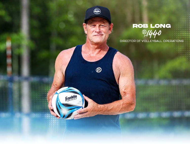 Rob Long, Director of Volleyball Operations for p1440 holds Franklin's new 9000 Game Beach Volleyball.