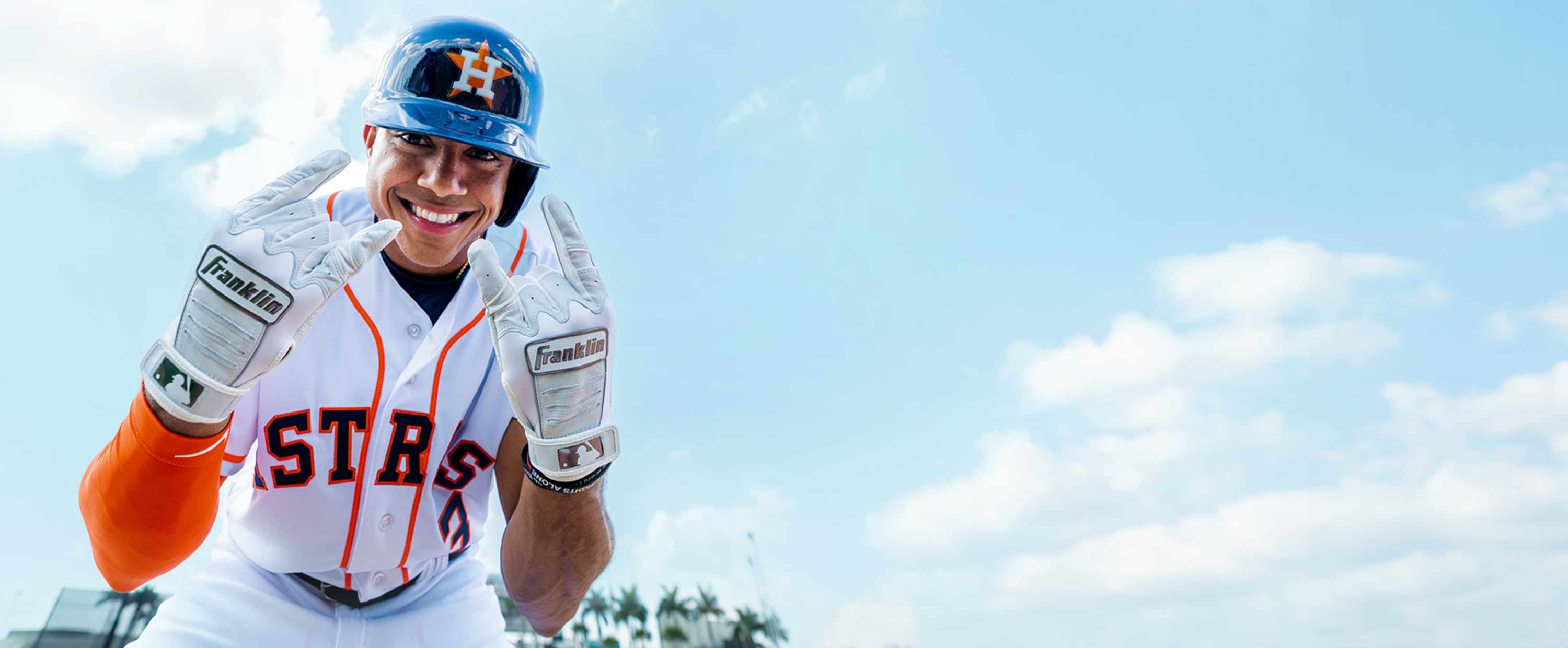 Baseball Player posing with Batting Gloves