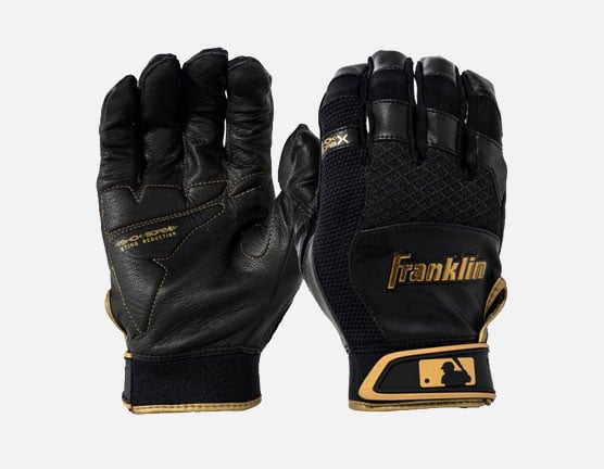 A detailed view of Franklin batting gloves and the Boston Red Sox