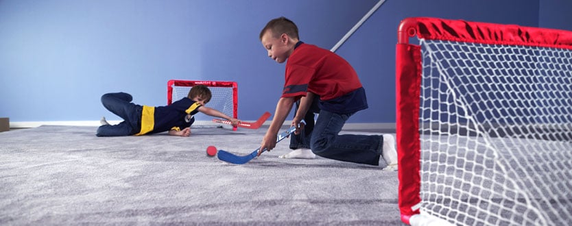 kids playing mini hockey