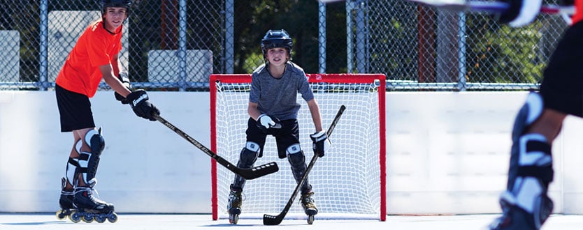 kids playing street hockey