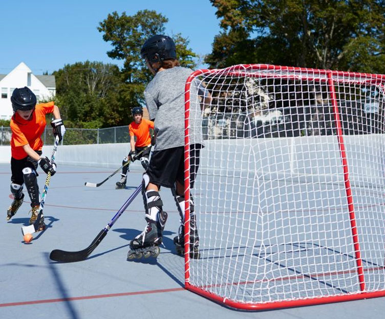kids playing street hockey