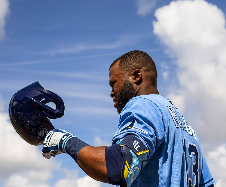 player taking helmet off