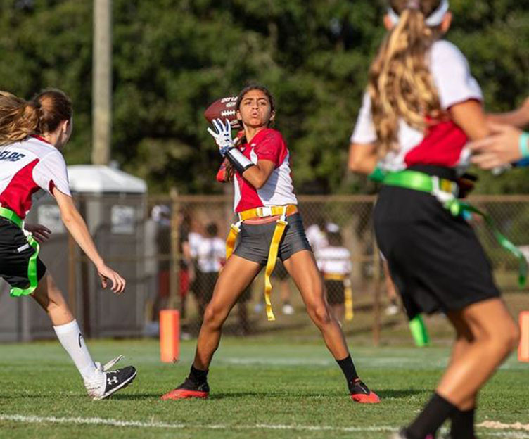 girls playing flag football