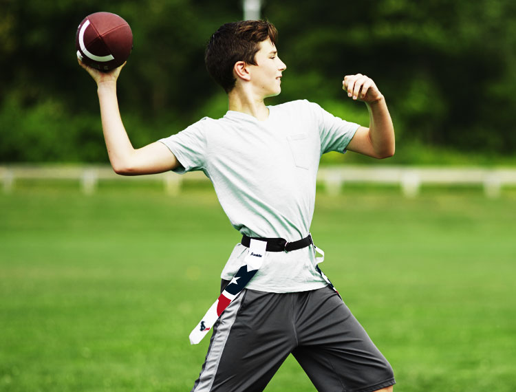 kid playing football